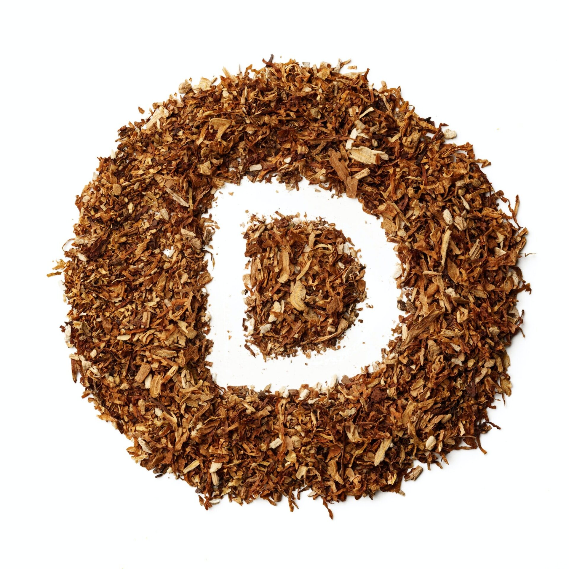 Letter D made of cigarettes dried smoking tobacco on white background